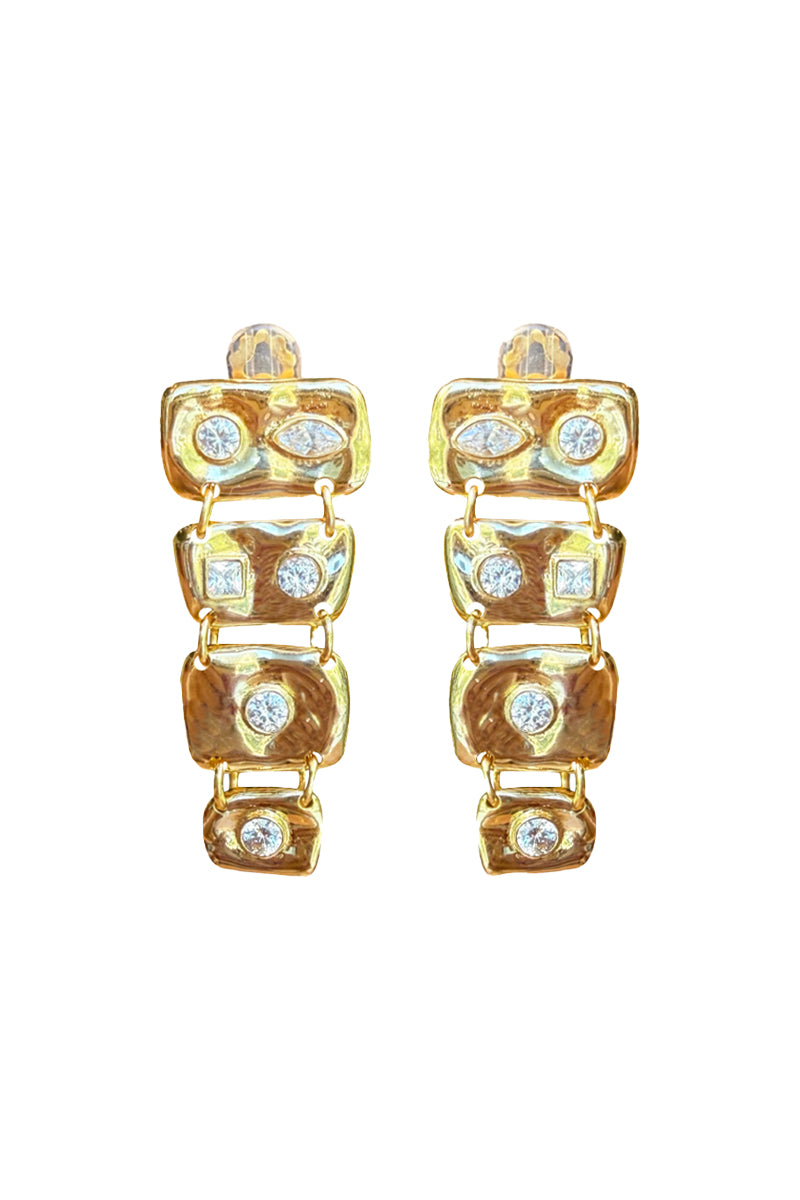 Jessica K B.O MINI Auris earrings featuring sleek, minimalist design with gold-tone finish and small hoop style.