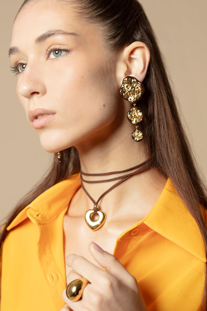 Jessica K B.O NIA brown earrings, stylish and elegant earrings featuring warm brown tones with intricate design details.