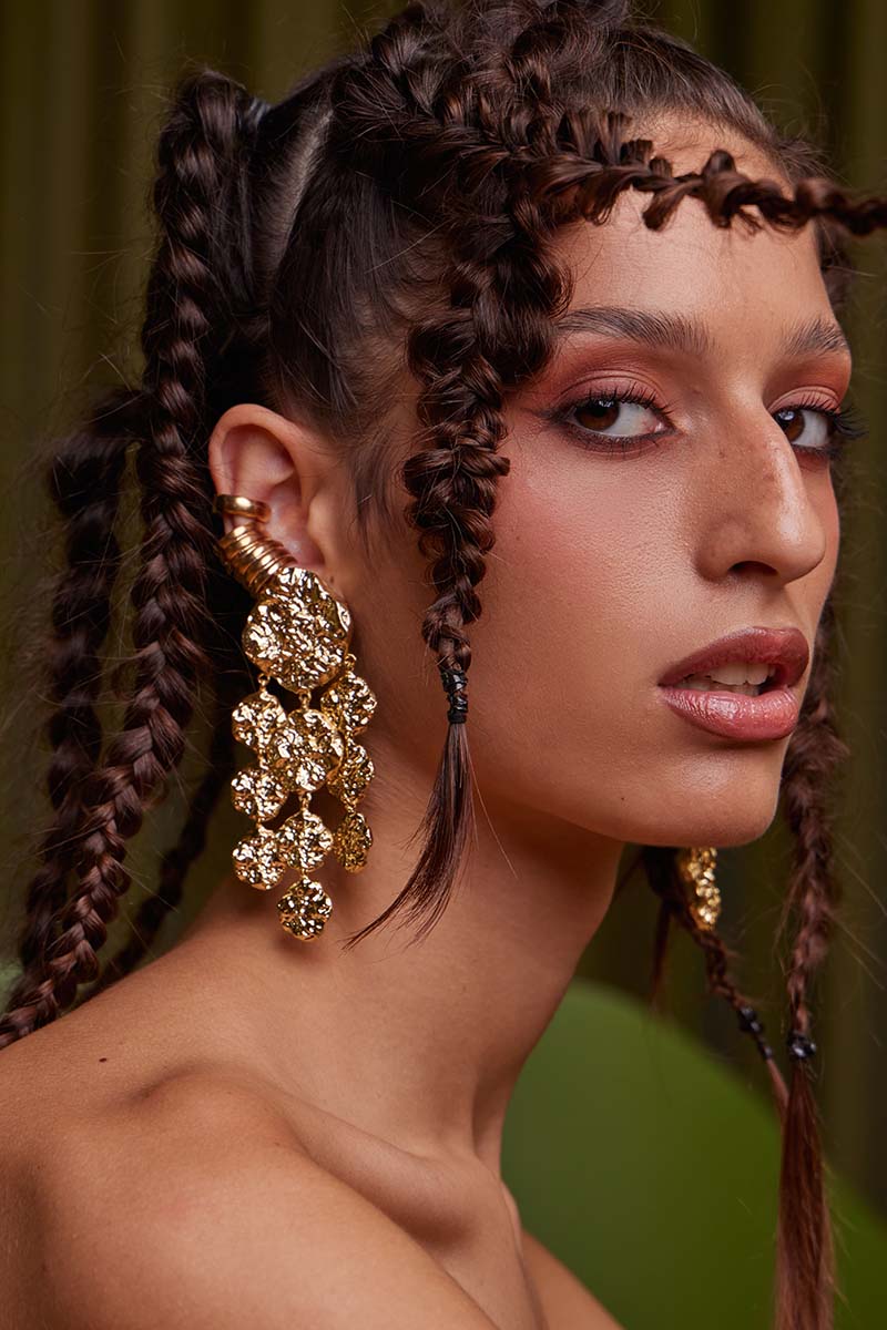 Jessica K B.O PHILI Gold Earrings, stylish jewelry accessory featuring gold earrings with intricate design details.
