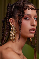 Jessica K B.O PHILI Gold Earrings, stylish jewelry accessory featuring gold earrings with intricate design details.