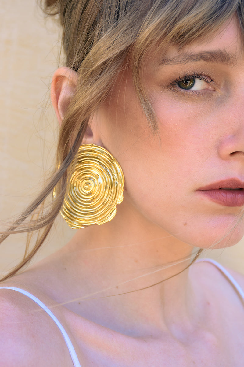 Jessica K B.O SOL earrings featuring sleek, modern design with polished finish and minimalist style.