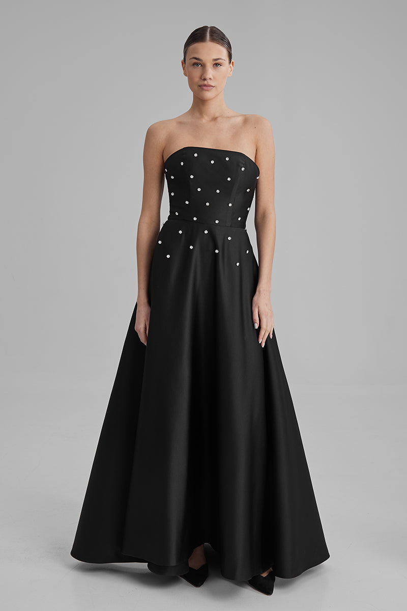 Black gown by BAÉ from the EVE DIAMONDS collection, featuring elegant fabric and sophisticated design for formal wear.