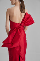 Red midi dress with a side bow from BAÉ, featuring a stylish and elegant design perfect for special occasions.