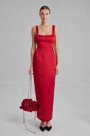 Red maxi dress by BAÉ, featuring a flowing design, sleeveless style, and elegant silhouette, perfect for summer or casual occasions.