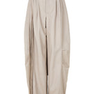 Ivory baggy leather fringe pants by MAZ Manuela Álvarez featuring relaxed fit and fringe detailing on the legs.