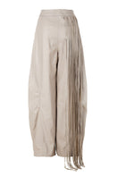 Ivory baggy leather fringe pants by MAZ Manuela Álvarez, featuring relaxed fit and stylish fringe details.