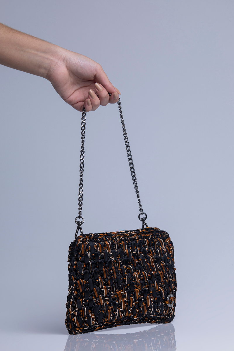 Catarina Mina black and brown clutch bag Brisa with sleek design and gold-tone hardware, perfect for evening or special occasions.