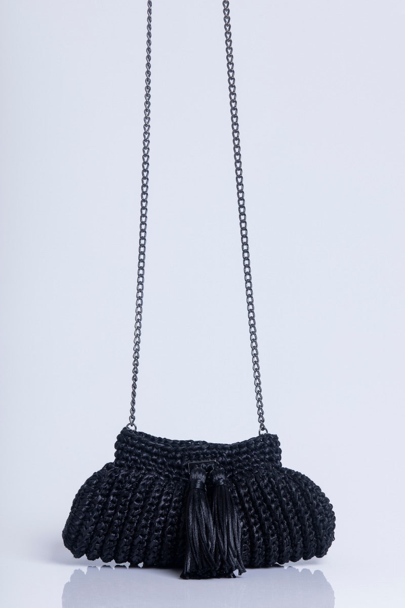 Black Catarina Mina Cantiga clutch bag with sleek design and compact size, perfect for evening and formal occasions.