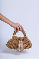 Gold Catarina Mina Cantiga clutch bag with intricate detailing and elegant design, perfect for evening occasions.