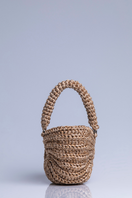 Catarina Mina concha top handle bag in sandy color, stylish accessory with a woven concha design and elegant handle.