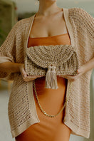 Catarina Mina Horizonte shoulder bag in sandy color with sleek design and adjustable strap for versatile styling.