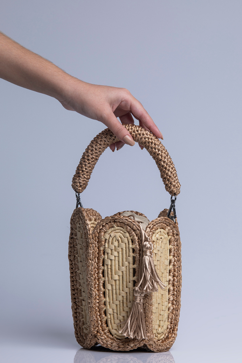Catarina Mina top handle bag in sandy beige with sleek design and minimalist style, featuring a structured silhouette and elegant straps.