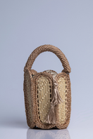 Catarina Mina top handle bag in sandy color with sleek design, featuring a structured shape and stylish shoulder strap.