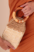 Catarina Mina milk-colored top handle bag with sleek design and sturdy handles, perfect for stylish everyday use.