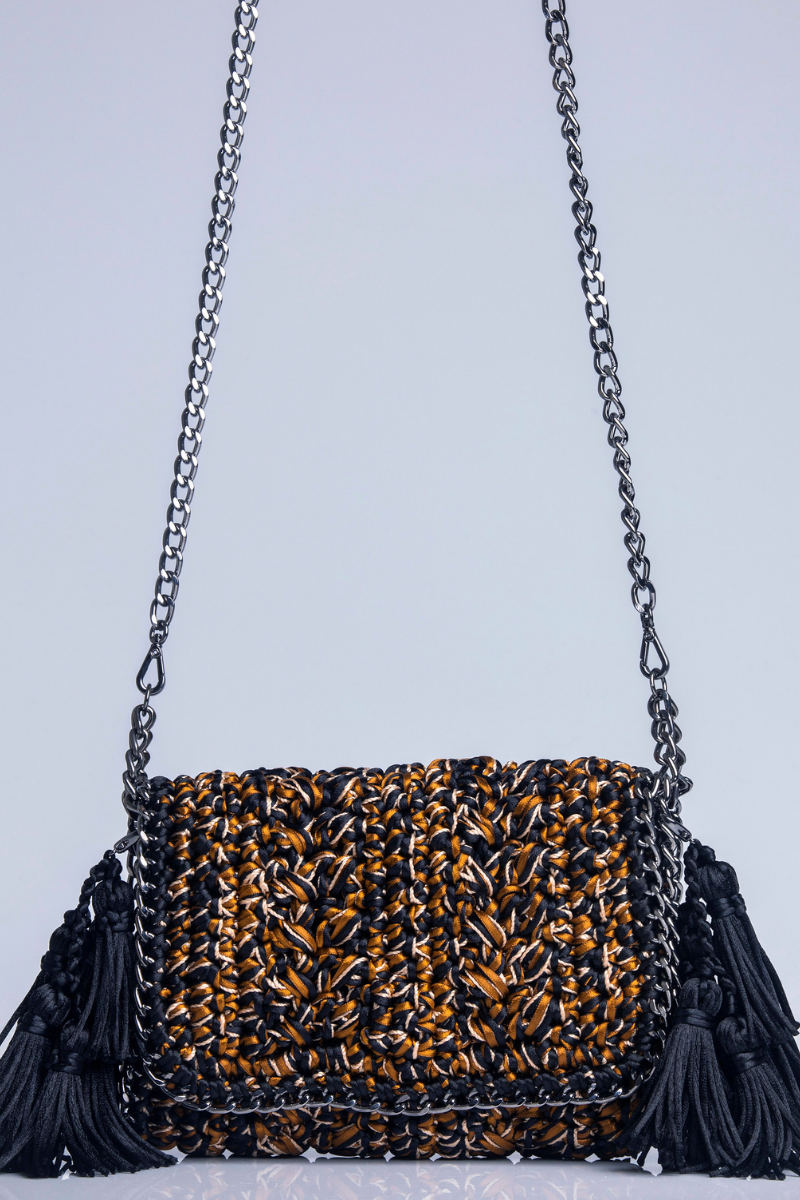 Black and brown Catarina Mina MIRA shoulder bag with sleek design, featuring a spacious interior and stylish leather finish.