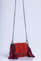 Catarina Mina MIRA grape-orange shoulder bag featuring a stylish design with a shoulder strap and textured material.