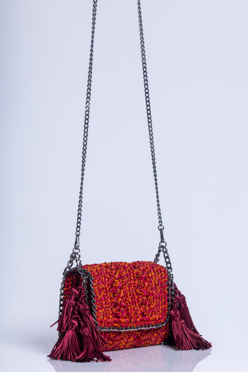 Catarina Mina MIRA grape-orange shoulder bag featuring a stylish design with a shoulder strap and textured material.