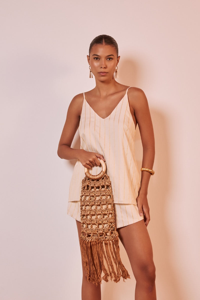 Catarina Mina Vera gold top handle bag with sleek design and structured silhouette, featuring a smooth leather finish.