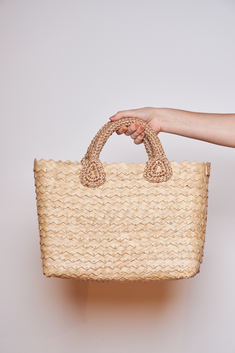 Catarina Mina top handle bag in sand color with tied design, stylish and elegant accessory for everyday use.