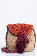 Catarina Mina mini Uru shoulder bag in vibrant grape-orange color with sleek strap and compact design.