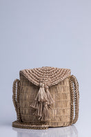 Catarina Mina mini Uru shoulder bag in sandy beige leather with a sleek, compact design and adjustable strap.