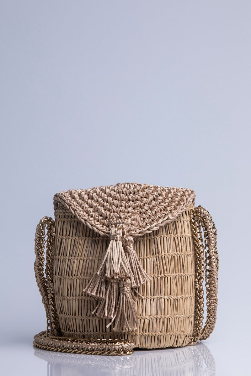 Catarina Mina mini Uru shoulder bag in sandy beige leather with a sleek, compact design and adjustable strap.