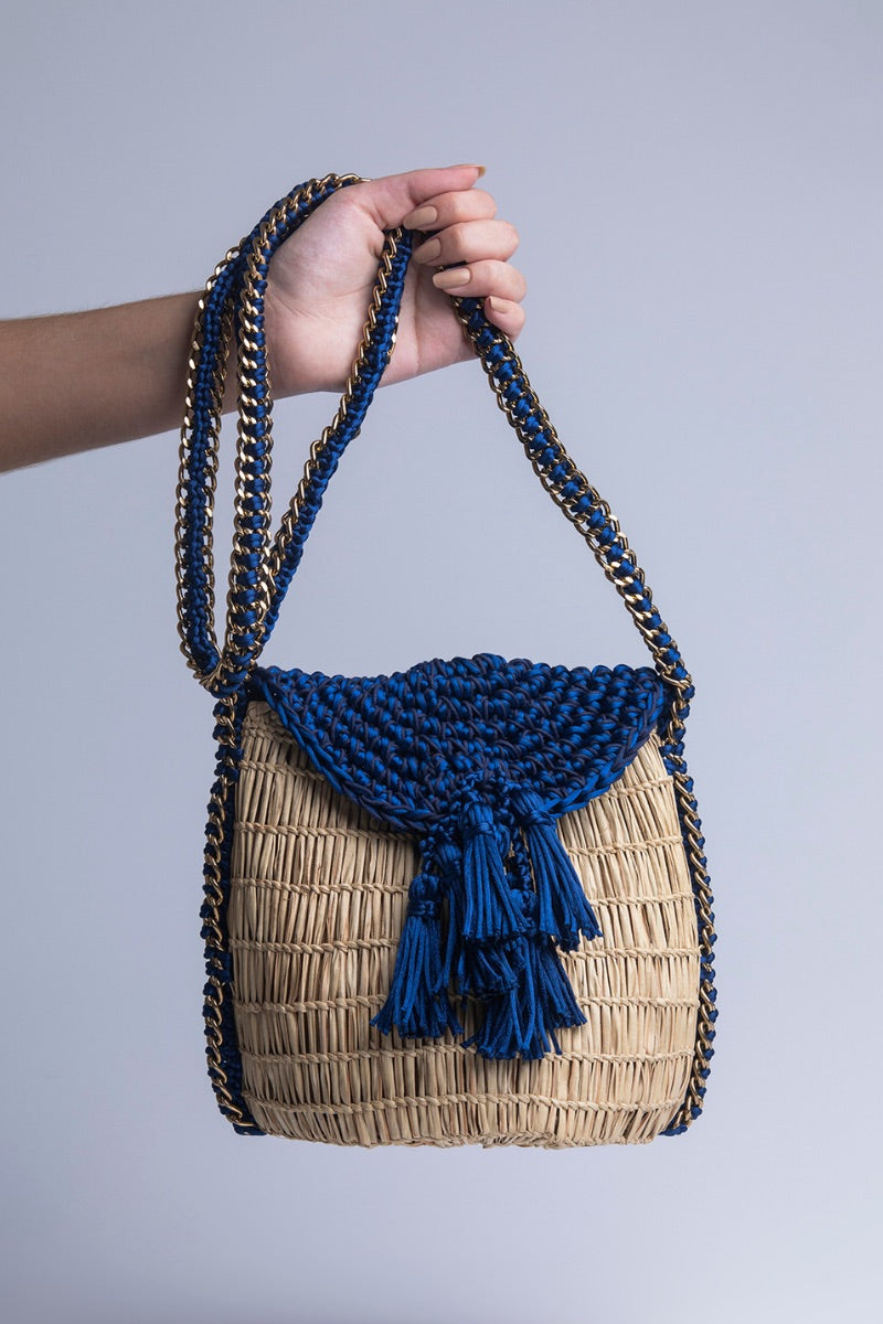 Navy mini Uru shoulder bag by Catarina Mina with sleek design and compact size, featuring a stylish strap and textured surface.
