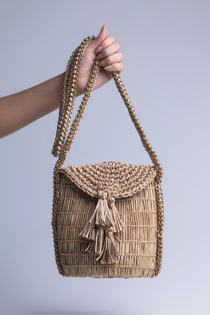 Catarina Mina mini Uru shoulder bag in sandy color with woven design and adjustable strap, stylish and compact for everyday use.