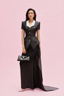 Jenny K Tran maxi skirt, barrow style, featuring flowing fabric and a stylish design shown in the image.