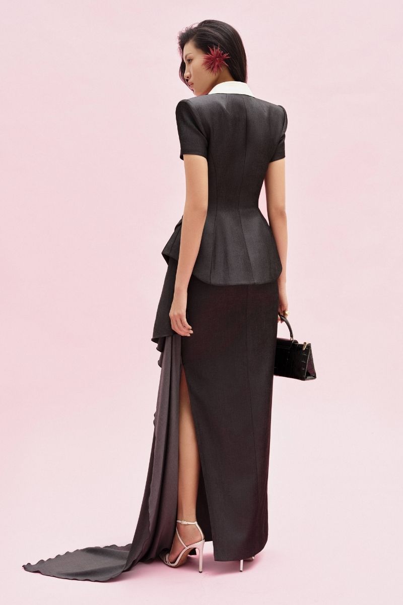Jenny K Tran maxi skirt with a flowy design and elegant style, showcased in a stylish barrow skirt image.