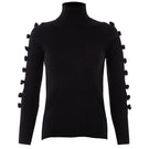 Black MAZ Manuela Álvarez Basic Bows sweater with a cozy knit design, displayed on a plain background.