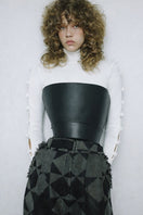 White Basic Bows sweater by MAZ Manuela Álvarez, featuring a cozy knit design and classic style.