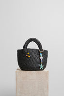 Black raffia basket bag with top handle from FolkLore The Label, stylish and perfect for casual and summer outings.