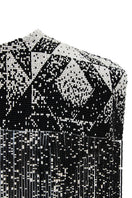 Beaded shoulder pads by MAZ Manuela Álvarez, body jewelry with intricate beadwork on stylish shoulder accessories.