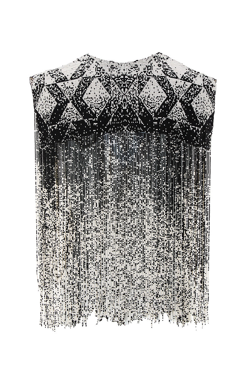 Beaded shoulder pads by MAZ Manuela Álvarez, stylish body jewelry with intricate beadwork on padded shoulder accessories.