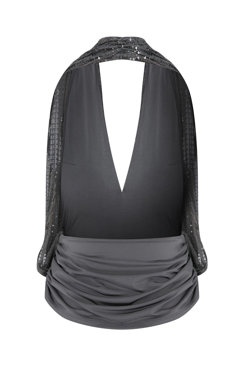 Beaded TAGG top featuring intricate beadwork, stylish design, and vibrant colors, perfect for trendy casual or evening wear.