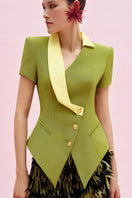 Jenny K Tran Bebington blazer jacket displayed on a hanger, featuring a tailored fit and classic design.
