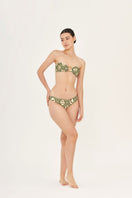 Aguaclara Bedouine hipster bikini bottoms in vibrant print, featuring a mid-rise fit and adjustable side ties on a white background.