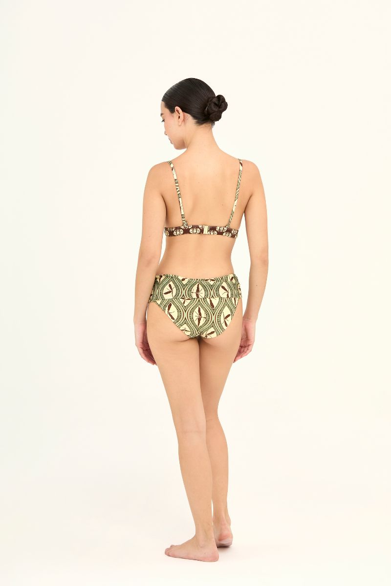 Aguaclara Bedouine fixed triangle bikini top in vibrant fabric, featuring classic triangle cups and adjustable straps.