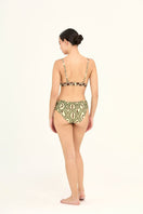 Aguaclara Bedouine fixed triangle bikini top in vibrant fabric, featuring adjustable straps and classic triangle design.