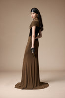 Elegant Jenny K Tran Bessie gown in black and umber fabric, featuring a flowing silhouette and intricate detailing.