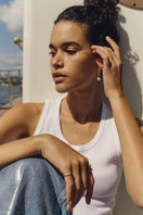 Peracas Bianca Hoops earrings in ivory, showing elegant hoop style with a smooth finish and subtle shine.