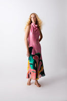 Sisters Bianca dress in taffy pink, a flowy maxi dress with a sleeveless design and elegant silhouette.