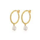 Peracas Bianca Hoops earrings in ivory, showcasing elegant hoop jewelry with a smooth, polished finish.