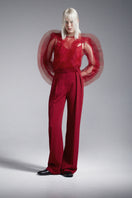 Red translucent tulle blouse with ruffled frills by Nadya Dzyak, featuring delicate sheer fabric and feminine design.