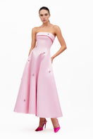 Baby pink Bloom gown by MOON / HAKAN YILDIRIM, featuring soft fabric and ruffled details, perfect for special occasions.