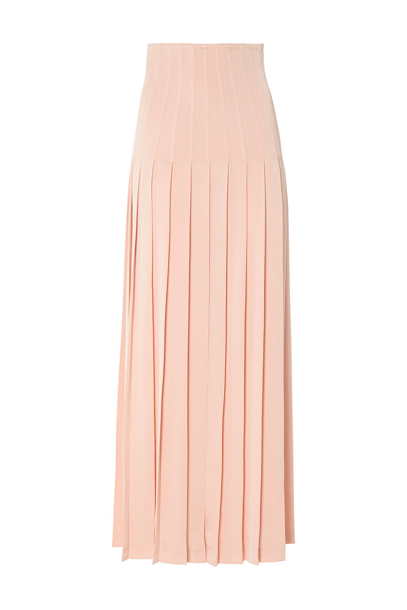 Studio NK Bloom Peach Maxi Skirt displayed on a model, featuring flowy fabric and floral design perfect for summer wear.