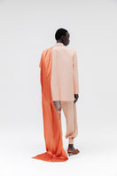 Studio NK ETHERAL peach blazer, tailored blazer with a sleek fit and modern design, shown on a model.