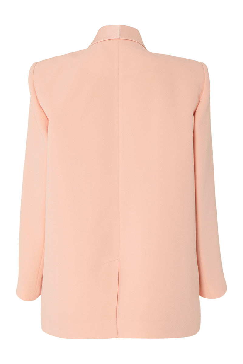 Studio NK ETHERAL peach blazer, tailored blazer with a sleek design, shown on a model against a neutral background.
