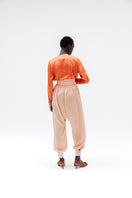 Studio NK Bloom Peach Pants, stylish women's trousers with a relaxed fit and soft peach color, perfect for casual wear.